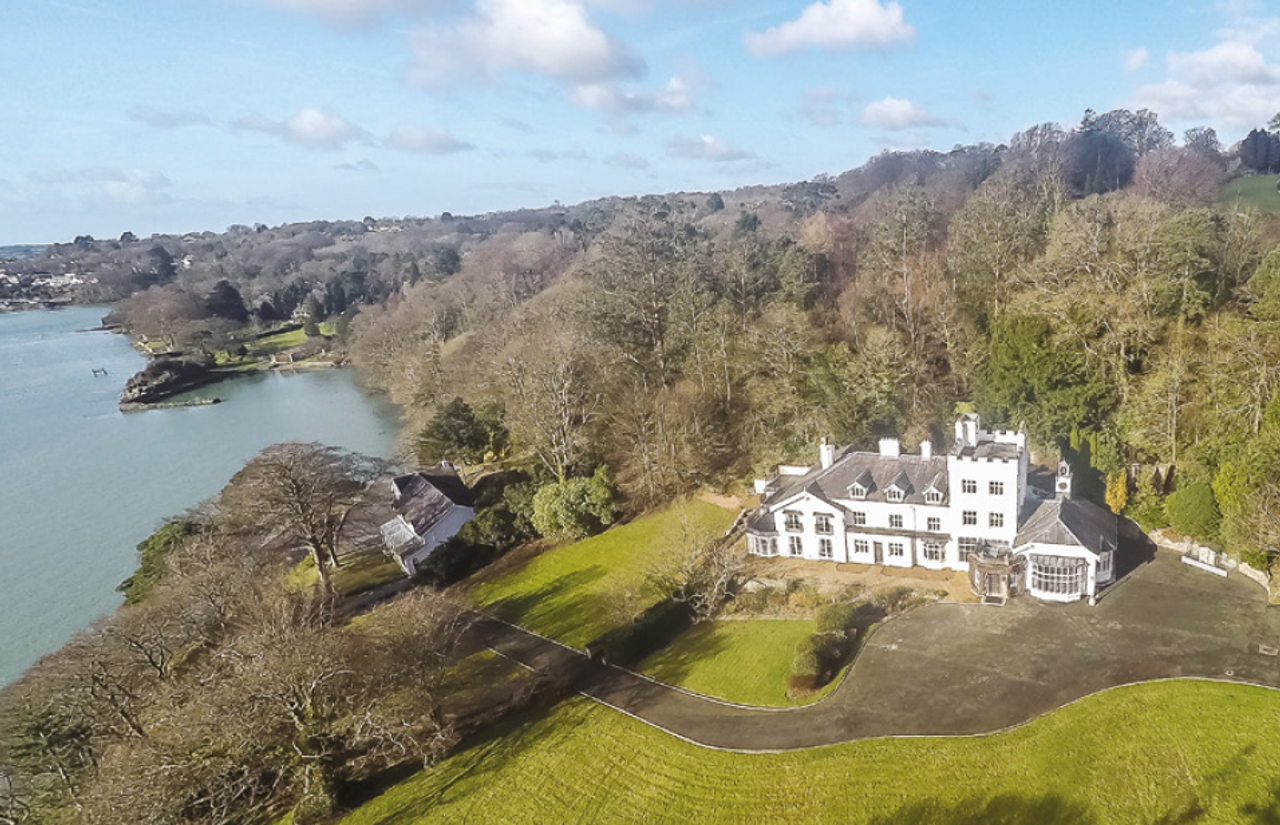 Craig Y Don aerial photography. Grade 2 listed house on Anglesey, North Wales.